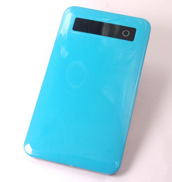 The new high-capacity ultra-thin candy-color touch screen mobile power charging treasure polymer